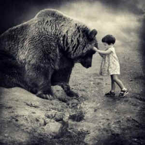 A woman meets her soul: photo of child and bear